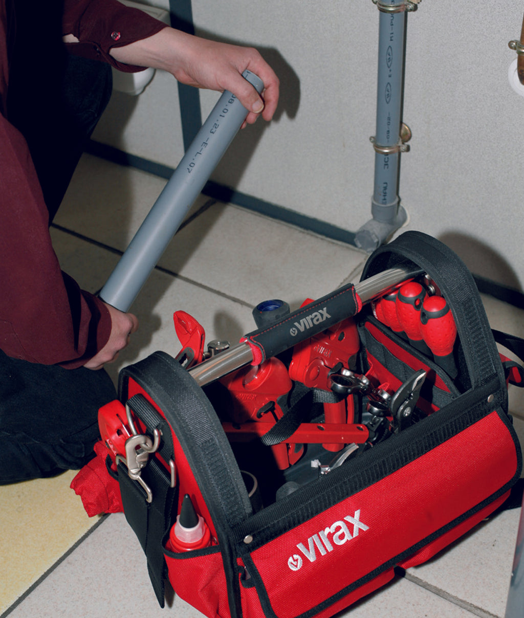 Red Virax tool bag with tools and a person using a tool on a tiled floor.

Virax Mini Textile Bag 38cm

Virax at Heating Engineer Supplies

Trade supplies Limerick
Trade supplies Ireland
Plumbing supplies Limerick
Plumbing supplies Cork
Plumbing supplies Dublin
Plumbing supplies Galway
Plumbing supplies Ireland