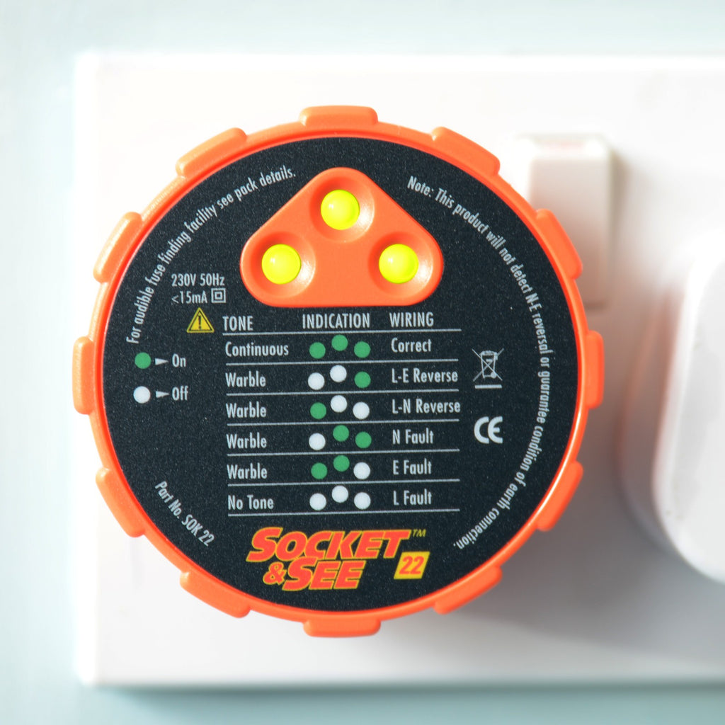 Socket & See 22 electrical tester with orange casing and visible branding on a light background